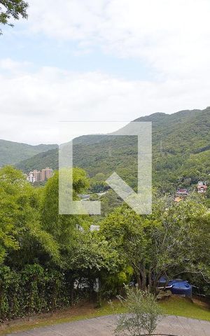 Casa de condomínio para alugar com 380m², 4 quartos e 6 vagasSala - Vista