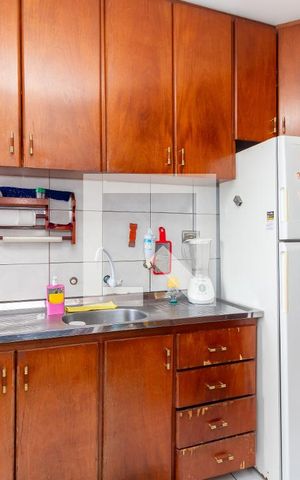 Apartamento à venda com 49m², 2 quartos e 1 vaga Apartamento à venda com 49m², 2 quartos e 1 vagaCozinha e Área de Serviço