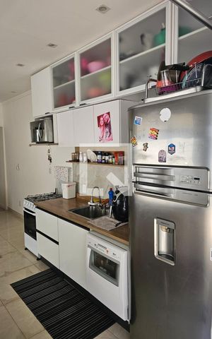 Casa à venda com 125m², 2 quartos e 2 vagas Casa à venda com 125m², 2 quartos e 2 vagasCozinha