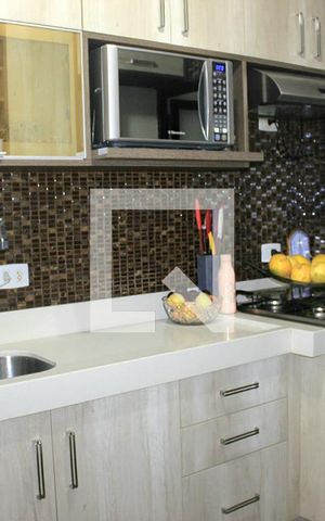 Apartamento para alugar com 70m², 2 quartos e 2 vagasCozinha