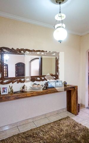 Casa à venda com 250m², 3 quartos e 2 vagas Casa à venda com 250m², 3 quartos e 2 vagasSala de estar