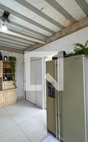 Casa à venda com 330m², 4 quartos e 4 vagas Casa à venda com 330m², 4 quartos e 4 vagasCozinha