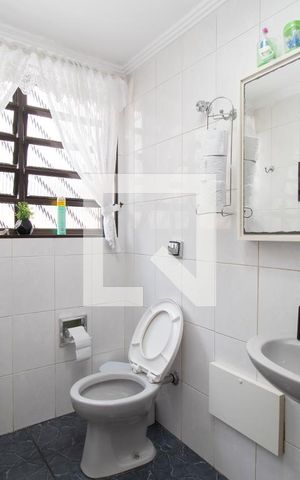 Casa à venda com 418m², 4 quartos e 6 vagasBanheiro Área de serviço