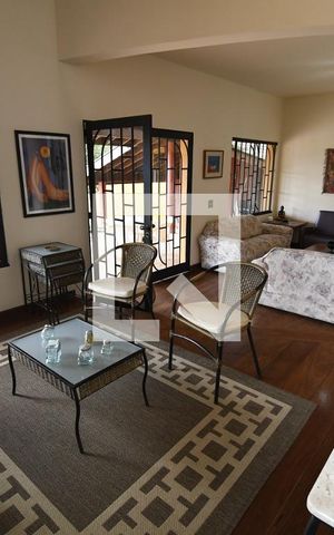 Casa de condomínio à venda com 400m², 5 quartos e 4 vagasSala