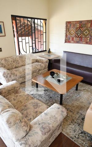 Casa de condomínio à venda com 400m², 5 quartos e 4 vagasSala