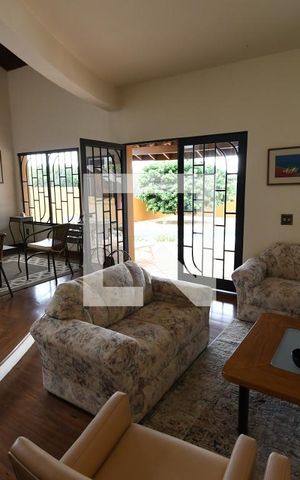 Casa de condomínio à venda com 400m², 5 quartos e 4 vagasSala