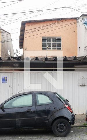 Casa à venda com 186m², 5 quartos e 2 vagas Casa à venda com 186m², 5 quartos e 2 vagasFachada do imóvel - Placa instalada no portão