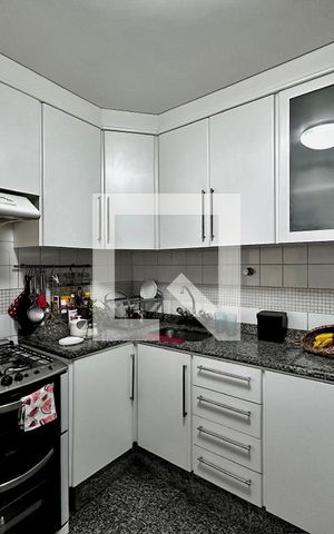 Casa à venda com 90m², 3 quartos e 2 vagas Casa à venda com 90m², 3 quartos e 2 vagasCozinha