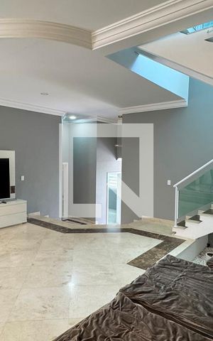 Casa de condomínio à venda com 403m², 4 quartos e 4 vagasSala