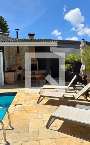 Casa de condomínio à venda com 403m², 4 quartos e 4 vagasChurrasqueira