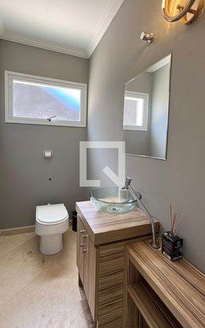 Casa de condomínio à venda com 403m², 4 quartos e 4 vagasLavabo