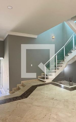 Casa de condomínio à venda com 403m², 4 quartos e 4 vagasSala