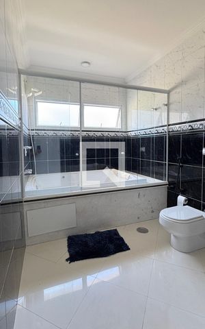 Casa de condomínio à venda com 403m², 4 quartos e 4 vagasBanheiro da Suíte 2