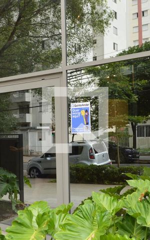 Apartamento à venda com 104m², 2 quartos e 2 vagasFachada + Plaquinha