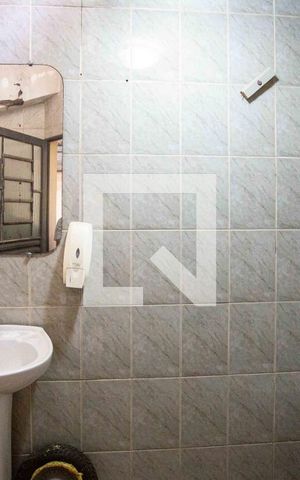 Casa à venda com 580m², 5 quartos e 6 vagasBanheiro de serviço