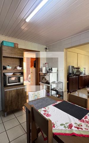 Casa à venda com 140m², 2 quartos e 4 vagas Casa à venda com 140m², 2 quartos e 4 vagasCozinha