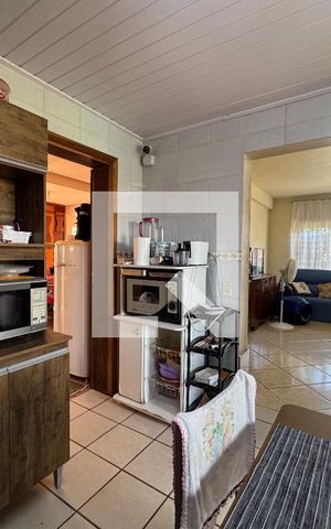 Casa à venda com 140m², 2 quartos e 4 vagas Casa à venda com 140m², 2 quartos e 4 vagasCozinha