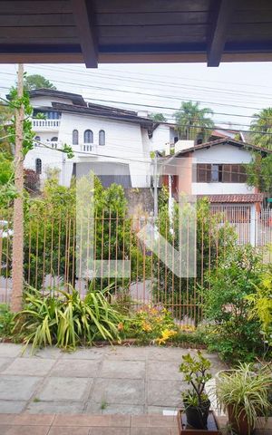 Casa à venda com 360m², 3 quartos e 2 vagas Casa à venda com 360m², 3 quartos e 2 vagasvista da Sala de TV