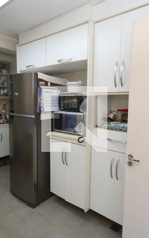 Casa de condomínio para alugar com 140m², 3 quartos e 2 vagasCozinha