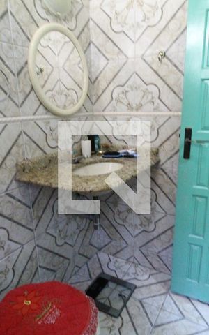 Casa de condomínio à venda com 210m², 4 quartos e 3 vagasBanheiro social