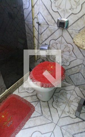 Casa de condomínio à venda com 210m², 4 quartos e 3 vagasBanheiro social