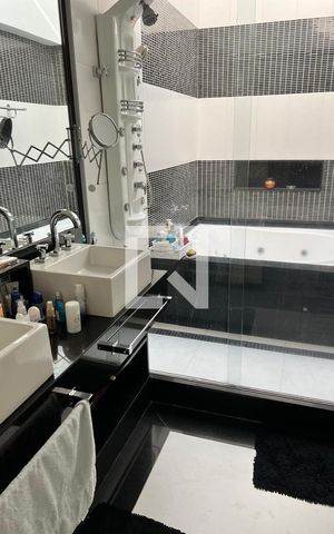 Casa de condomínio à venda com 415m², 4 quartos e 2 vagasBanheiro