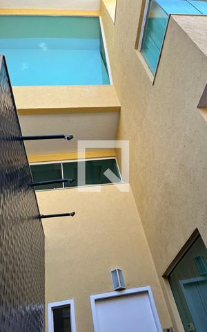 Casa de condomínio à venda com 415m², 4 quartos e 2 vagasFachada