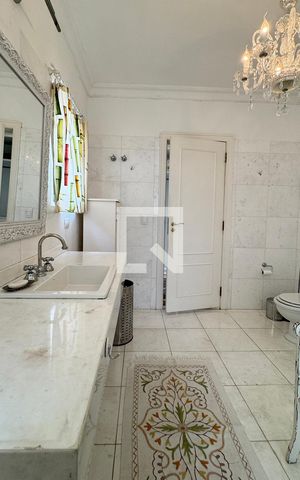Casa de condomínio à venda com 614m², 4 quartos e 6 vagasBanheiro da Suíte 1