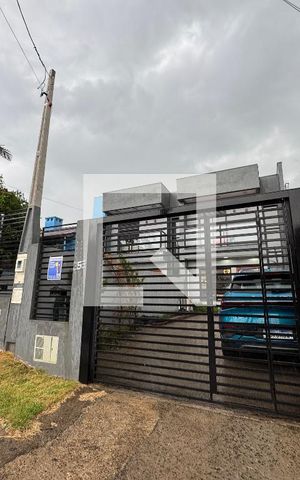 Casa à venda com 110m², 3 quartos e 3 vagas Casa à venda com 110m², 3 quartos e 3 vagasFachada