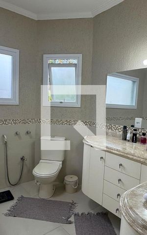 Casa de condomínio à venda com 360m², 5 quartos e 6 vagasBanheiro da Suíte 1