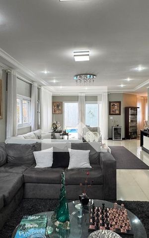 Casa de condomínio à venda com 360m², 5 quartos e 6 vagasSala