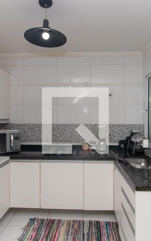 Casa de condomínio à venda com 100m², 2 quartos e 1 vaga Casa de condomínio à venda com 100m², 2 quartos e 1 vagaCozinha