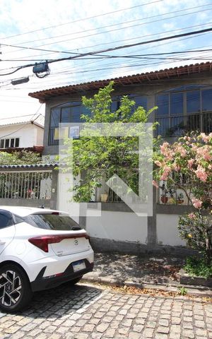 Casa de condomínio à venda com 275m², 3 quartos e 2 vagasFachada com Placa Quinto Andar