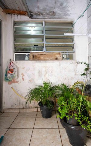 Casa à venda com 194m², 4 quartos e 1 vagaÁrea de Serviço Casa 1