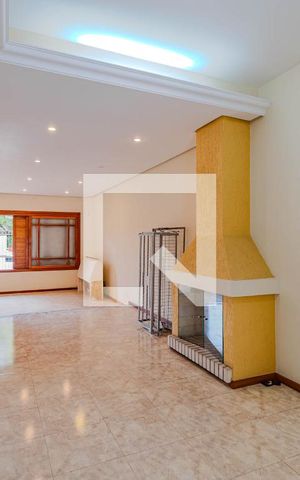 Casa de condomínio à venda com 380m², 4 quartos e 2 vagas Casa de condomínio à venda com 380m², 4 quartos e 2 vagasSala