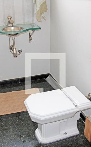 Casa de condomínio à venda com 440m², 4 quartos e 3 vagasLavabo