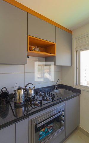 Apartamento à venda com 45m², 2 quartos e 1 vaga Apartamento à venda com 45m², 2 quartos e 1 vagaCozinha e Área de Serviço