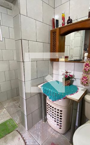 Casa à venda com 160m², 4 quartos e 3 vagas Casa à venda com 160m², 4 quartos e 3 vagasBanheiro 1