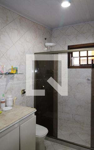 Casa à venda com 320m², 5 quartos e 8 vagasBanheiro da Suíte 3