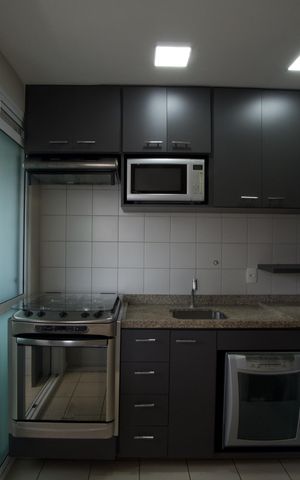Apartamento para alugar com 65m², 1 quarto e 2 vagas Apartamento para alugar com 65m², 1 quarto e 2 vagasCozinha e Área de Serviço