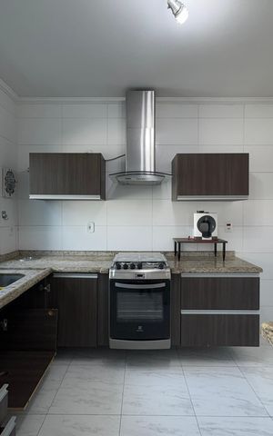 Casa à venda com 137m², 3 quartos e 2 vagas Casa à venda com 137m², 3 quartos e 2 vagasCozinha