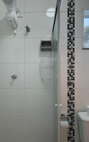 Casa à venda com 137m², 3 quartos e 2 vagas Casa à venda com 137m², 3 quartos e 2 vagasBanheiro da Suíte