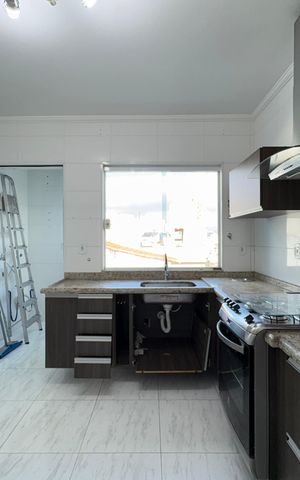 Casa à venda com 137m², 3 quartos e 2 vagas Casa à venda com 137m², 3 quartos e 2 vagasCozinha