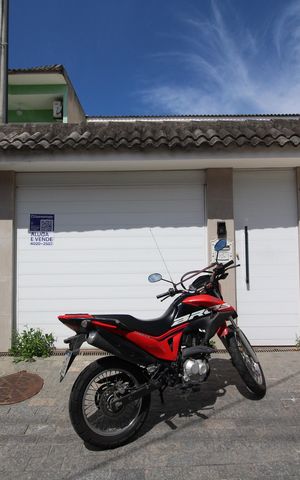 Casa de condomínio à venda com 140m², 3 quartos e 1 vagaFachada com Placa