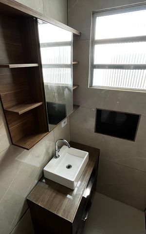 Casa à venda com 499m², 5 quartos e 8 vagas Casa à venda com 499m², 5 quartos e 8 vagasBanheiro da Suíte 1
