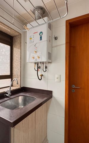 Apartamento à venda com 125m², 4 quartos e 2 vagas Apartamento à venda com 125m², 4 quartos e 2 vagasCozinha e Área de Serviço