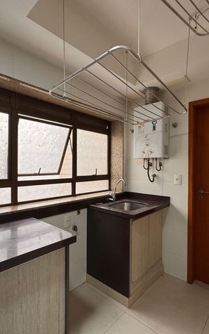 Apartamento à venda com 125m², 4 quartos e 2 vagas Apartamento à venda com 125m², 4 quartos e 2 vagasCozinha e Área de Serviço