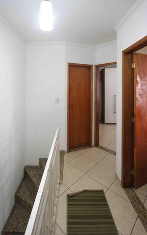 Casa à venda com 110m², 3 quartos e 2 vagas Casa à venda com 110m², 3 quartos e 2 vagasCorredor