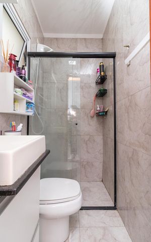 Casa de condomínio à venda com 60m², 2 quartos e 2 vagasBanheiro da Suíte 2