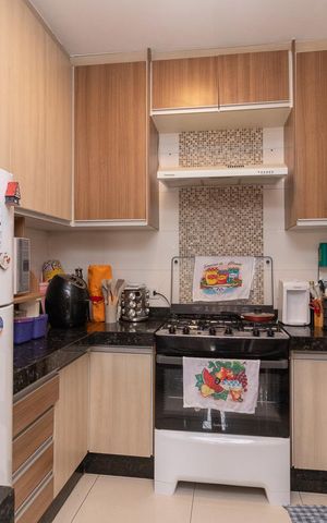 Casa de condomínio à venda com 60m², 2 quartos e 2 vagasCozinha